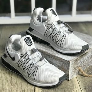 nike shox gravity black white